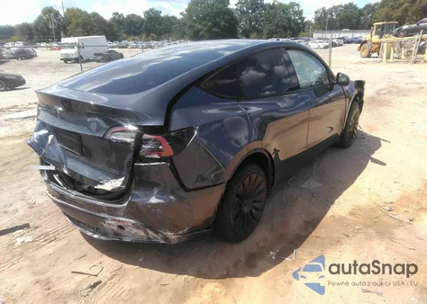 2023 Tesla Model Y Awd/Long Range Dual Motor All-Wheel Drive z USA, uszkodzony, nr VIN 7SAYGDEE4PF614106